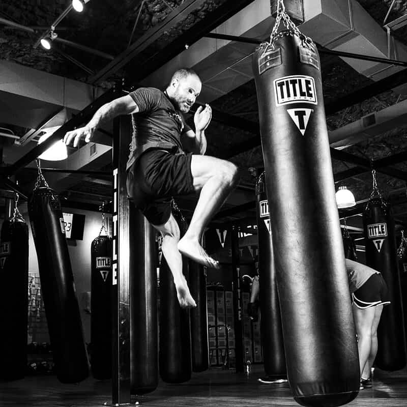 Mixed Martial Arts Lessons for Adults in Huntington Station NY - Flying Knee Black and White MMA